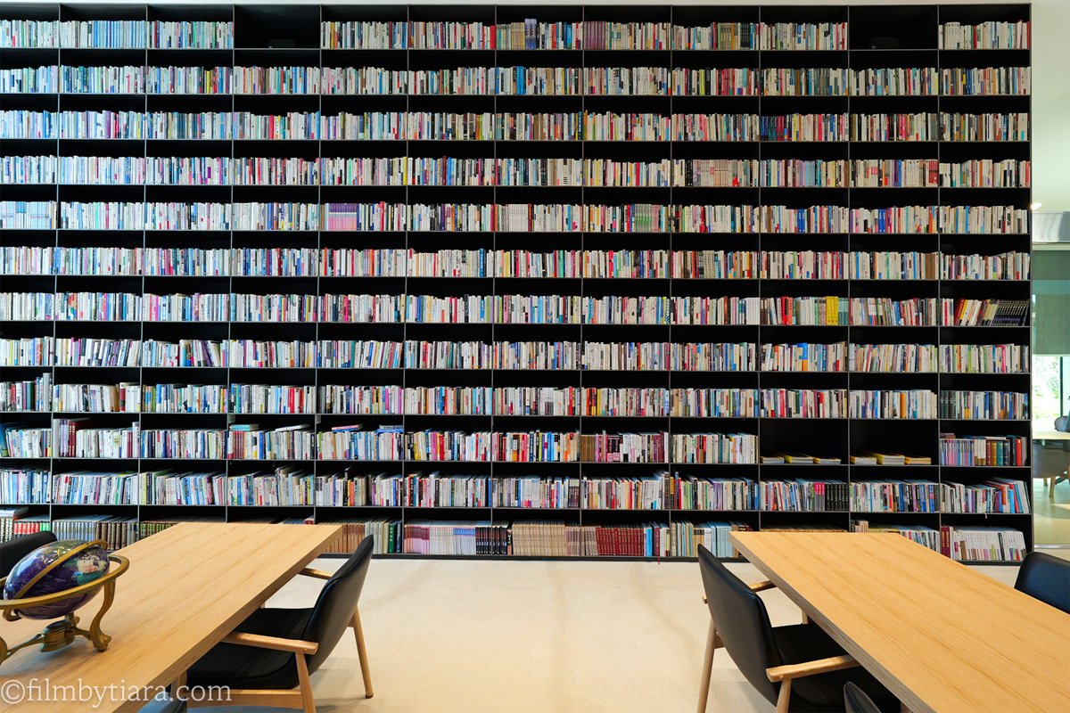 Close-up of library bookshelves at FOREST AG405 arboretum