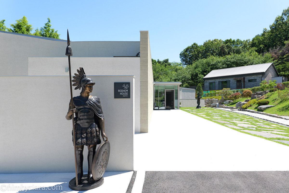 Rodem House entrance guarded by a Roman soldier statue at FOREST AG405