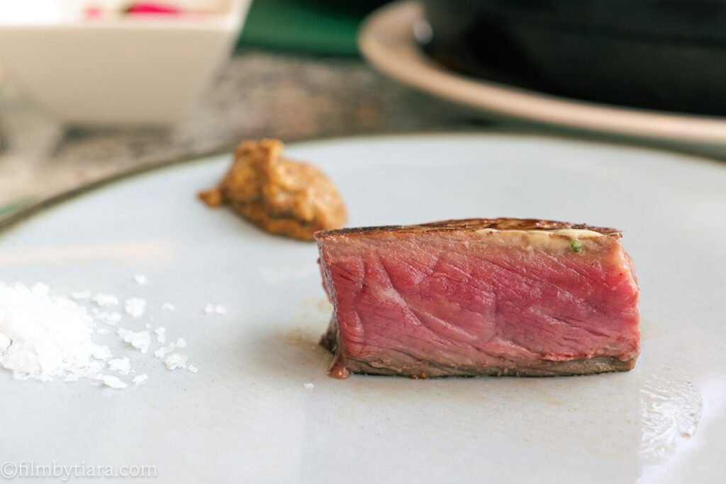 A Piece of US Prime dry aged ribeye steak served at Restaurant Voisin
