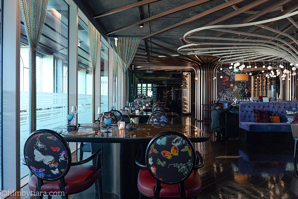 Purple-themed luxury dining room at Mariposa at Fairmont Seoul