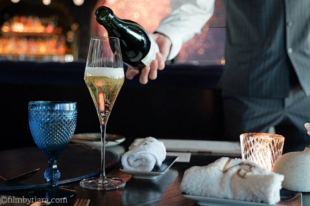 Champagne glass with a scenic view at Mariposa at Fairmont Seoul